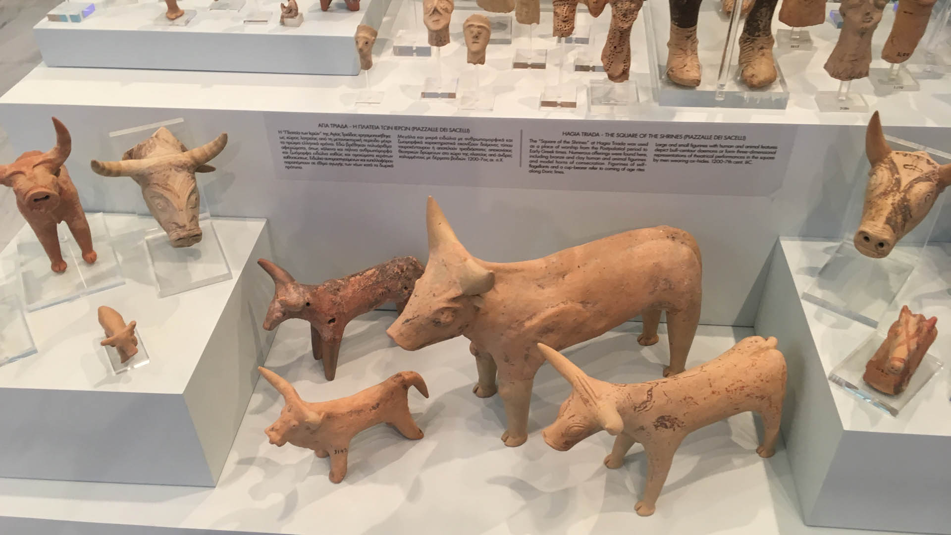 A collection of objects, including animal figurines and (parts of) zoomorphic rhyta, from Agia Triada.